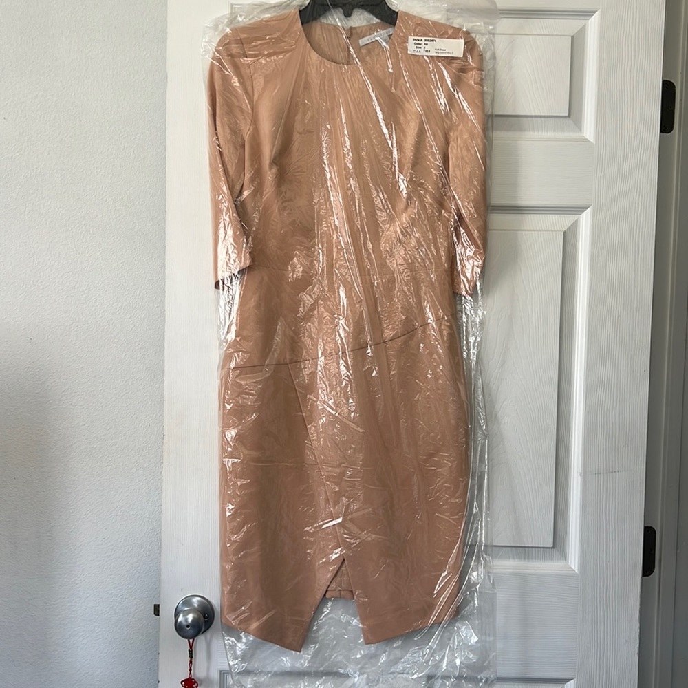 Black halo pale/pastel pink dress, size 2. Never worn
